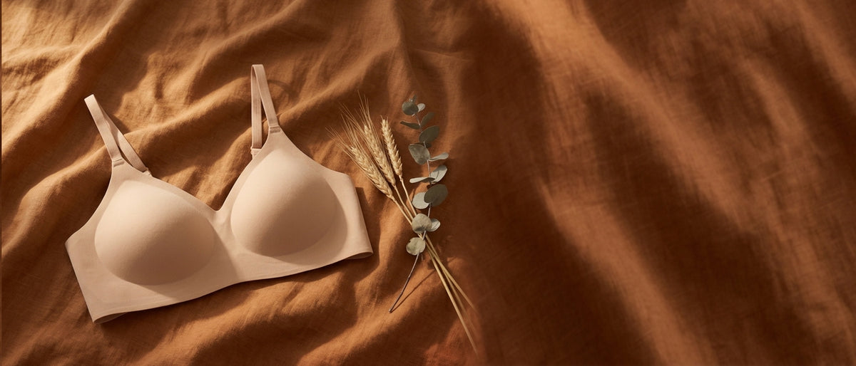 Kiri Every Day Bra in nude on warm autumn linen with dried wheat and eucalyptus