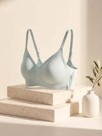 Kiri Brielle Blue wireless bra on stacked travertine blocks 3
