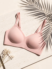 Kiri Heather Pink wireless bra on pale travertine 4